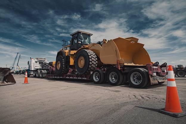 transportation by hauler articulated and Lowboy trucks